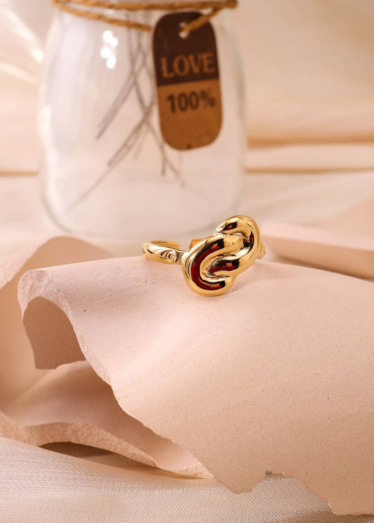 Anillo dorado con lazo