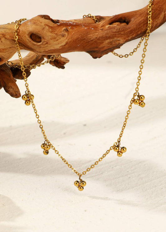 Collar dorado con 5 minicolgantes