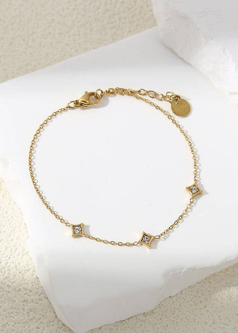 Pulseira de ouro ajustável com estrelas e strass